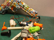 Assorted parts for the 2 GUARD Gel Snipers blasters