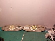 2 fl citrus bowl cast hanging signs