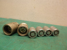 Set Of 4 Locking Lug Nuts With 2 Removable Tools