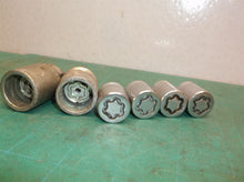 Set Of 4 Locking Lug Nuts With 2 Removable Tools