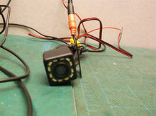 Small camera with leds and harness