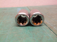 (2) 12mm 1.25 rht locking lug nuts