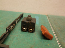Assorted parts for a Drill Master 4 1/2" Angle Grinder #60625