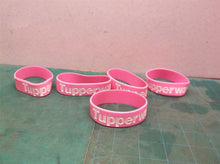 5 Tupperware bracelets pink