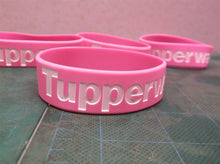 5 Tupperware bracelets pink