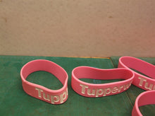 5 Tupperware bracelets pink