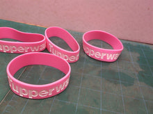 5 Tupperware bracelets pink