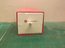 Empty Tupperware watch box