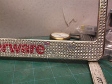 Tupperware License plate frame 1 new 1 used