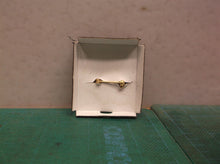 Tupperware ladies broch pin 1 " round with 7 stones in black box