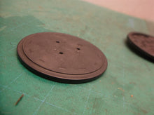 (4) Tupperware Coasters Black Fountain Design