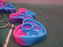 4pcs blue/pink pop fidget keychain set
