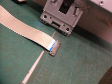 ribbon cable & inner metal housing off a Lenovo a18238fd0 COMPUTER DISPLAY