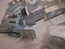 Assortment Of Window Treatment Hardware Pieces With Screws
