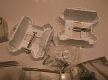 Assortment Of Window Treatment Hardware Pieces With Screws