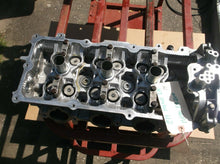 11090-EA200 LH Cylinder Head Off Of A 2009 Nissan Xterra 4.0L 6 Cylinder
