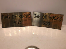 (2) "Bag Of Rocks / $6.50" Etched Signs - Measures 2" x 4"