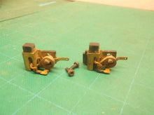 N097702 (2) Brush Box Assembly from a DeWALT DWE4011 4.5" Small Angle Grinder