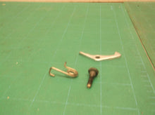 Gaurd lock assembly from a DeWALT DWE4011 4.5" Small Angle Grinder