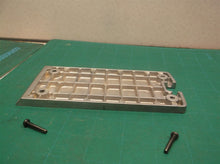 Rear plate with screws from a DEWALT D26676 PORTABLE HAND PLANER