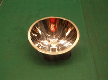 Reflector cone and bulb off of a Rayovac Plastic Krypton Floating Lantern 6-Volt
