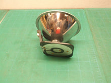 Reflector cone and bulb off of a Rayovac Plastic Krypton Floating Lantern 6-Volt