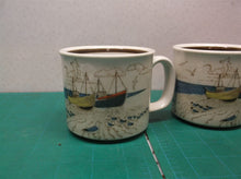 lot of 2 Beach Boat themed coffee cups