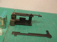 635641001 CONTACT & part of DRIVE MASS from a Ryobi P317 18V Crown Stapler