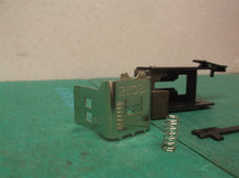 635641001 CONTACT & part of DRIVE MASS from a Ryobi P317 18V Crown Stapler