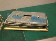 assorted metal wall outlet & switch plates covers