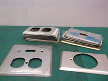 assorted metal wall outlet & switch plates covers