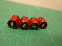 4 piece Chevrolet valve stem caps red
