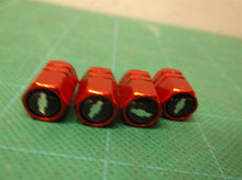 4 piece Chevrolet valve stem caps red