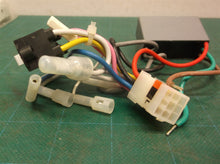 Start capacitor from a Hunter 51309 Ridgefield 44-in Ceiling Fan
