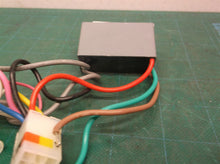 Start capacitor from a Hunter 51309 Ridgefield 44-in Ceiling Fan