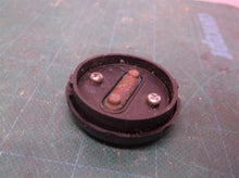 Battery door from a Craftsman 4-in-1 Laser Trac Level Model 320.48251