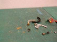 assorted parts from a Craftsman 4-in-1 Laser Trac Level Model 320.48251