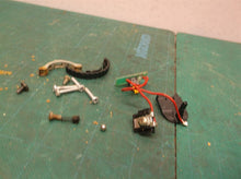 assorted parts from a Craftsman 4-in-1 Laser Trac Level Model 320.48251