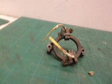 Brush holder with brushes from a Dewalt DW402 angle Grinder