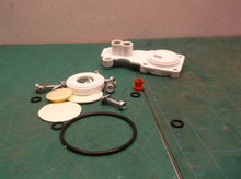 Assorted parts from a ge gxrv40tbn00 ro system