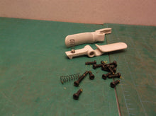 Assorted parts & hardware off a Ryobi 40V RY40204 string trimmer