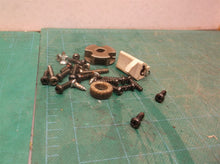 Assorted parts from a Off A Homelite UT43104 Electric Chain Saw
