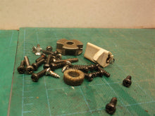 Assorted parts from a Off A Homelite UT43104 Electric Chain Saw