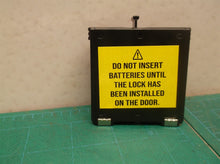 battery holder off a Kwikset 888 deadbolt