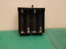 battery holder off a Kwikset 888 deadbolt