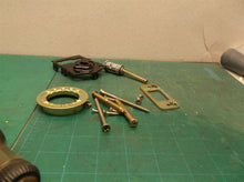 Assorted parts off a Kwikset Aura Satin Nickel Electronic Bluetooth Keypad Smart
