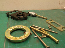 Assorted parts off a Kwikset Aura Satin Nickel Electronic Bluetooth Keypad Smart
