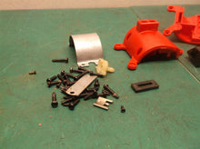 assorted parts off a Milwaukee 2475-20 M12 Compact Tire Inflator