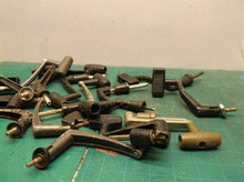lot of 15 large reel handles with shaft