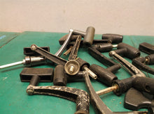 lot of 15 large reel handles with shaft